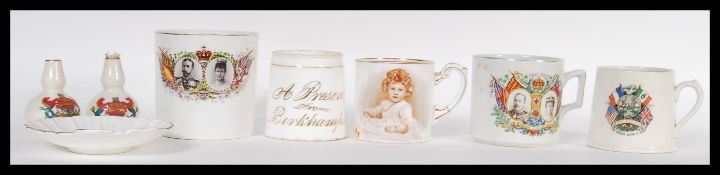 A small collection of early 20th century royal commemorative mugs to include, two King George and
