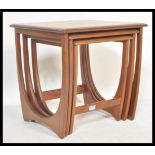 A G-Plan retro teak wood 1970's graduating nest of tables in the Quadrille pattern. The tables