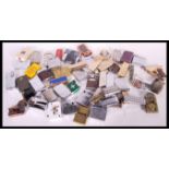 A large collection of vintage lighters to include 3 x Zippo lighters, novelty gun lighters,