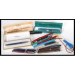 A collection of vintage 20th Century ink fountain pens to include Sheaffer, Parker, Waterman,