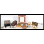 A collection of vintage boxes and matchbox covers to include a Victorian snuff box engraved T. Davis