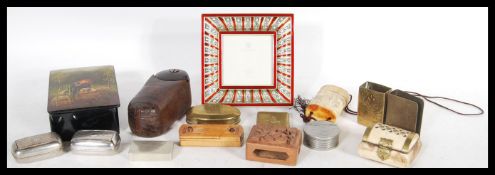A collection of vintage boxes and matchbox covers to include a Victorian snuff box engraved T. Davis
