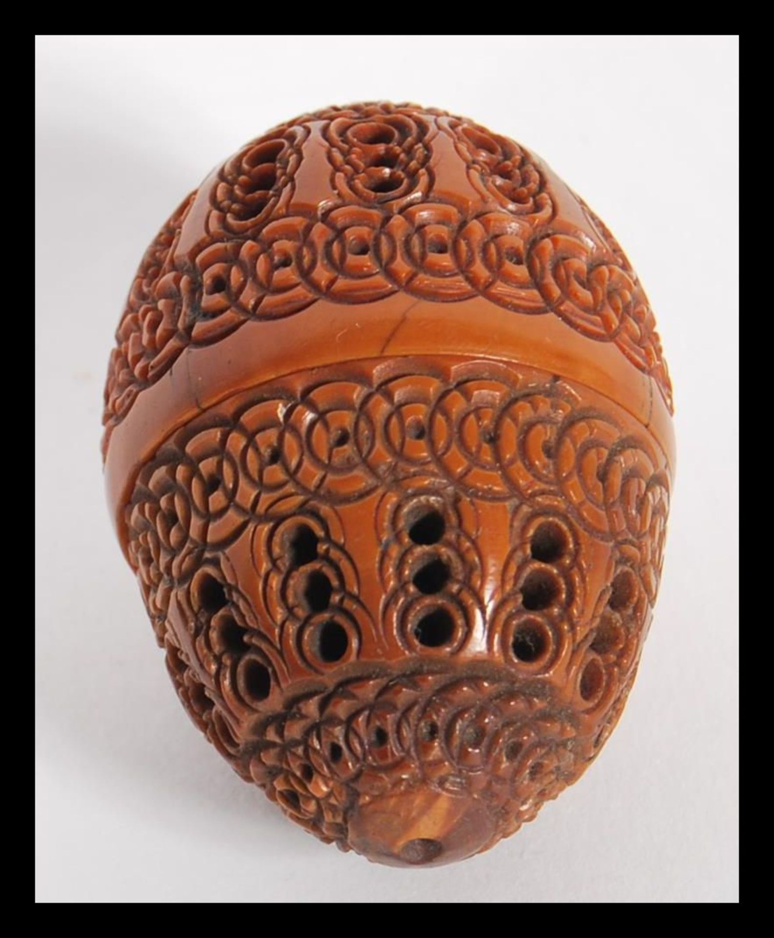 A 19th Century treen carved coquilla nut, the nut carved for use as a nutmeg grinder holder, the - Bild 2 aus 4