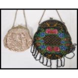 Two early 20th Century 1920's ladies clutch handbags to include a German black beaded example with