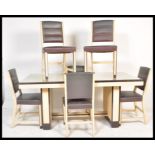 A vintage retro mid 20th Century 1950's post war Art Deco dining suite consisting of table and six