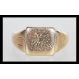 A hallmarked 9ct gold signet ring having a square cartouche panel with engraved initials. Hallmarked