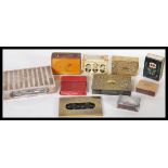 A collection of vintage early 29th Century match box covers and holders to include silver plated