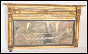 A 19th century overmantel gilt wood and gesso mirror having a gilt finish with acanthus leaf