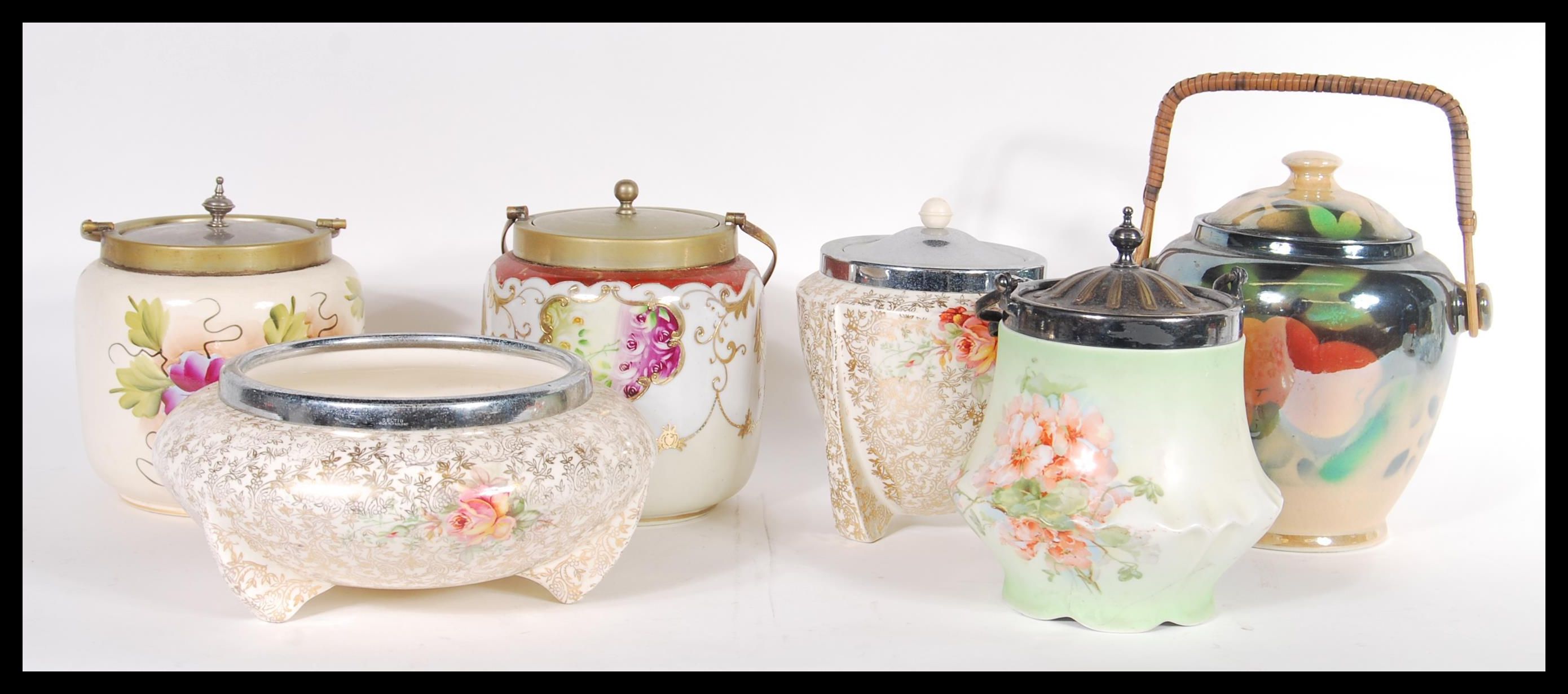 A collection of ceramic biscuit barrels dating from the early 20th Century to include Ivory blush