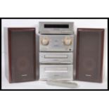 A 20th Century Technics separates stacking music system consisting of CD player, radio receiver,