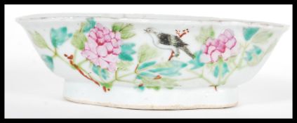 An early 20th Century Chinese porcelain bowl of scalloped form having hand painted decoration
