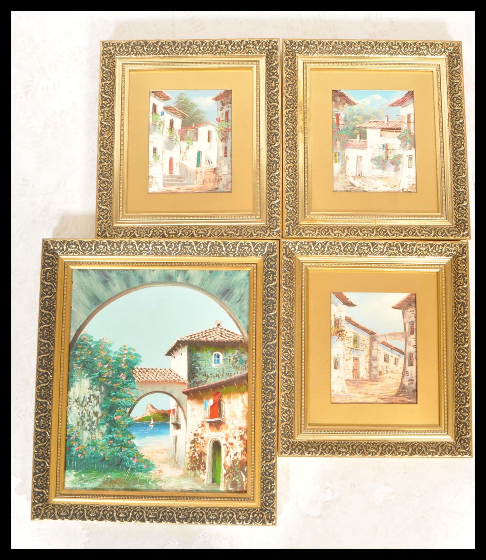 A group of four 20th Century Spanish oil on canvas gouache paintings in the manner of Doyle Jon.
