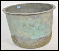 A 19th large copper coal bin / copper / planter of typical form having riveted sides and shaped