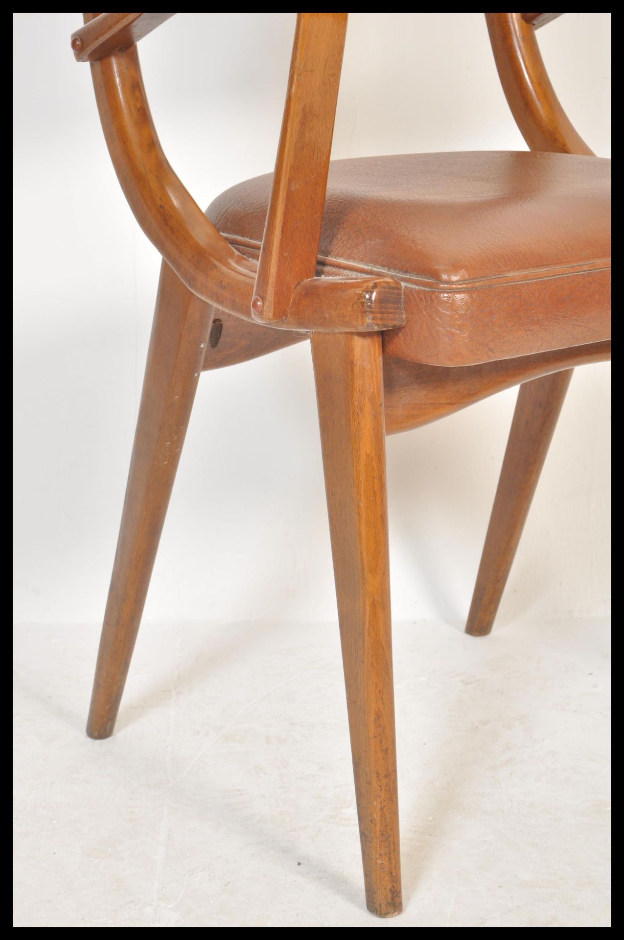 A vintage retro 20th Century Ben Chairs armchair raised on shaped angular legs with leather / faux - Bild 2 aus 5