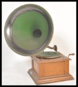 A vintage 1920's Edwardian oak cased table top / picnic gramophone, with speed regulator screw and