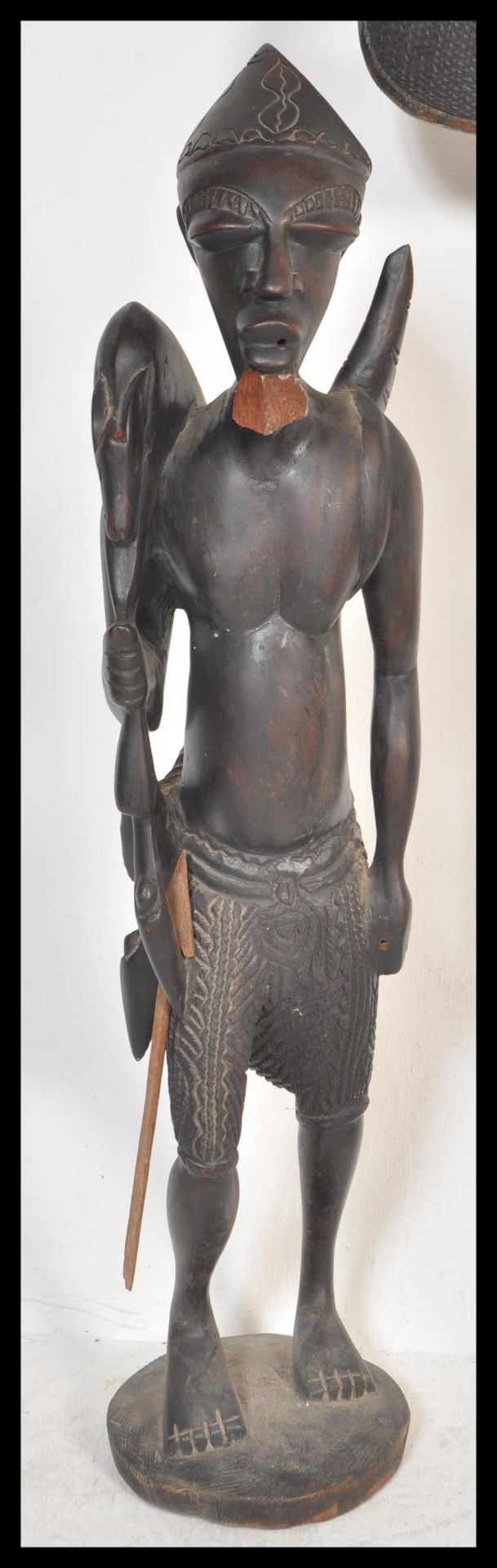 Two 20th Century African carved wooden artifacts to include a large ebony warrior fertility statue - Bild 3 aus 7