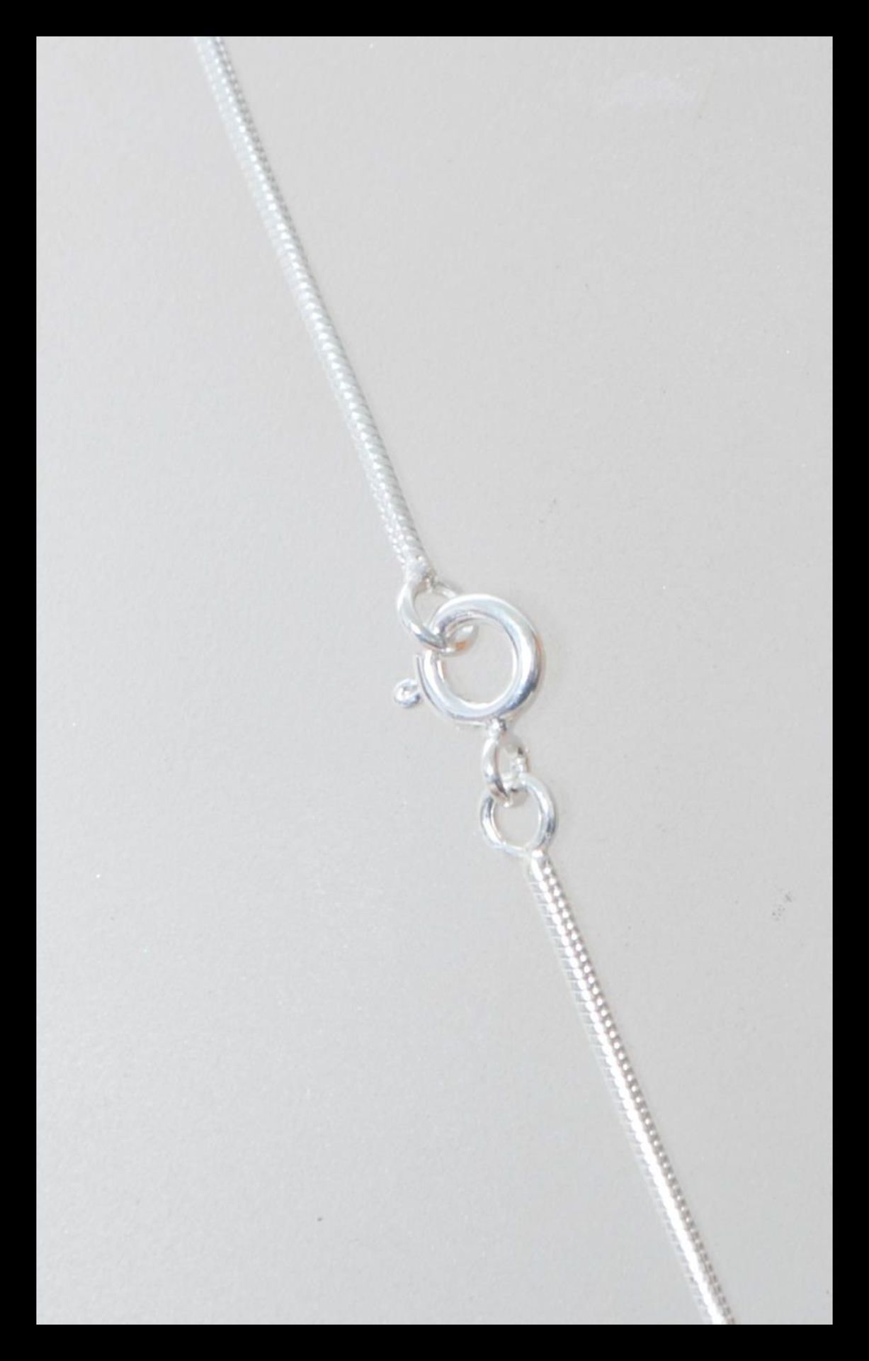 A stamped 925 silver necklace having an art nouveau style pendant set with cz's and opals, set to - Bild 3 aus 3