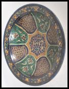 A 19th Century Middle Eastern Islamic pottery bowl of circular form having hand painted decorative