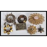 A collection of silver Yiddish / Jewish jewellery to include mostly brooches dating from the early