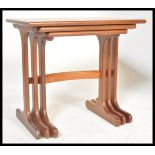A G-Plan retro teak wood 1970's graduating nest of tables in the Quadrille pattern. The tables