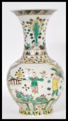 A 19th Century Chinese porcelain baluster vase having famille verte decoration depicting children