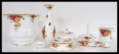 A small collection of 20th Century Royal Albert ceramics in the Country Roses pattern to include