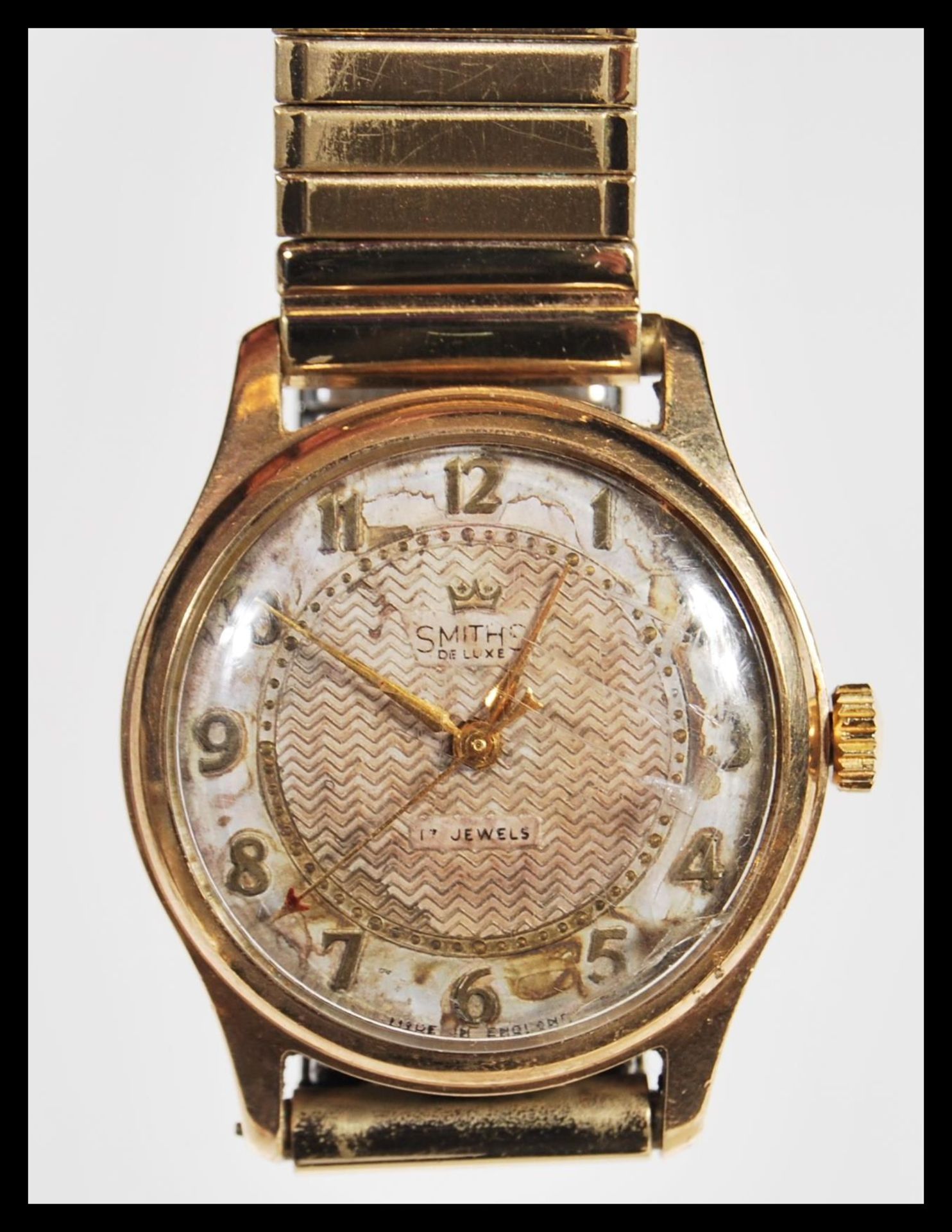 A mid 20th Century 17 jewels Smiths De Luxe 9ct gold gentlemen's wrist watch, on a Fixo-flex