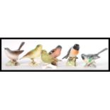 A collection of Besick china bird figurines to include a Grey Wagtail 1041, Stonechat 2274,