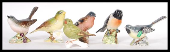 A collection of Besick china bird figurines to include a Grey Wagtail 1041, Stonechat 2274,