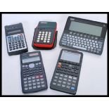 A group of vintage Scientific calculators to include a Psion series 3a, Elsi Mate EL-8005S, Casio