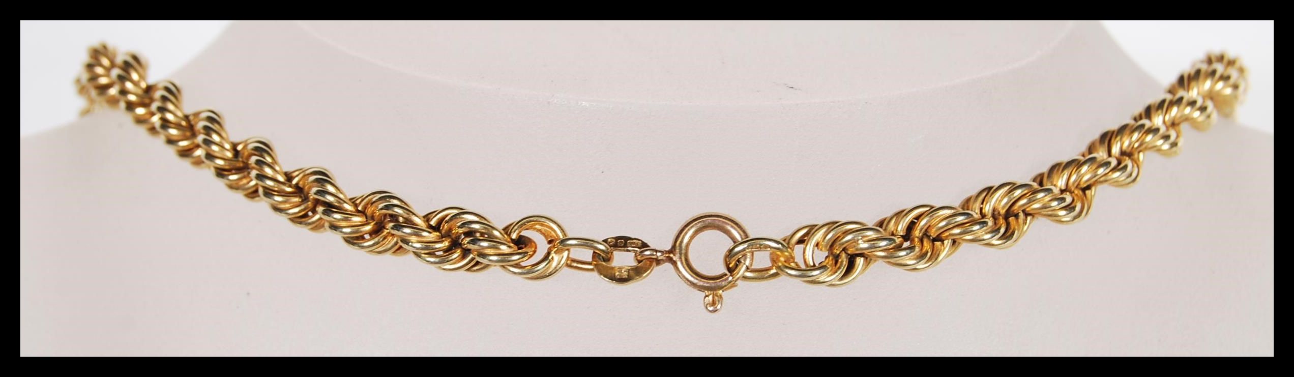 A hallmarked 9ct gold rope twist necklace chain of graduating form having bolt ring clasp. - Image 3 of 3