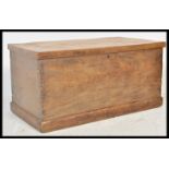 An early 19th Century Georgian elm blanket box steamer trunk coffer chest having a hinged lid with