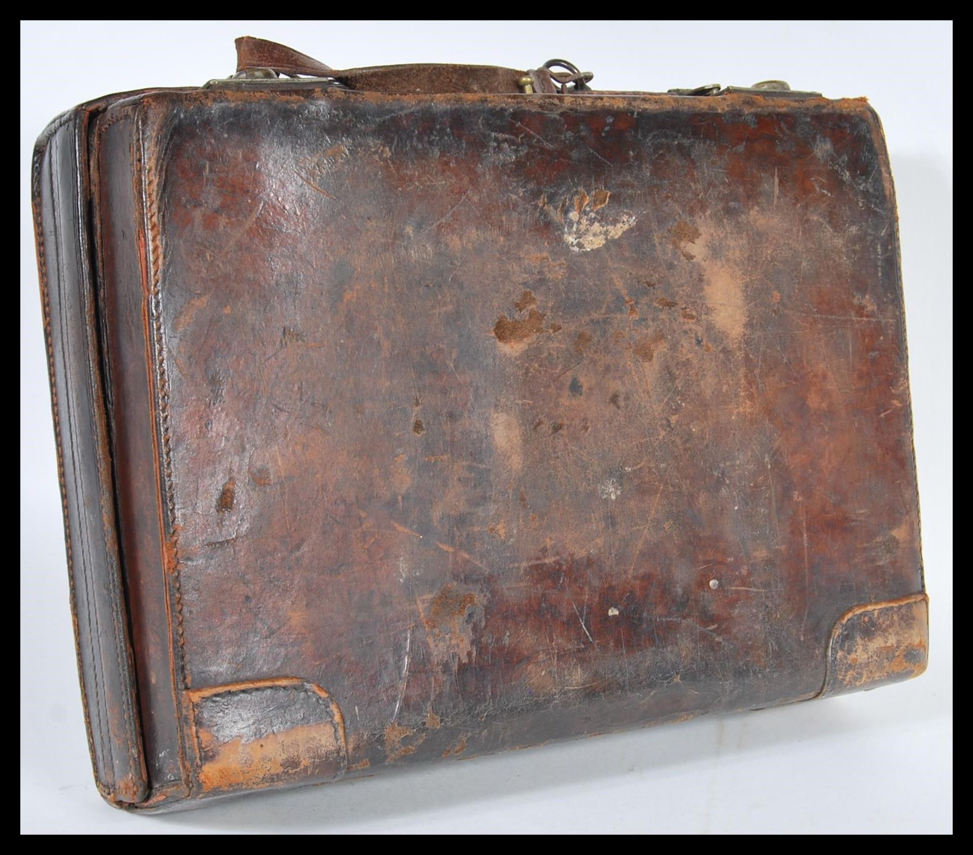 A vintage 20th Century leather attache / briefcase, Carry handle atop with brass locks to the front, - Image 2 of 4