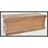 A 19th Century Victorian pine woodworking toolbox  / blanket box chest having a hinged top with side