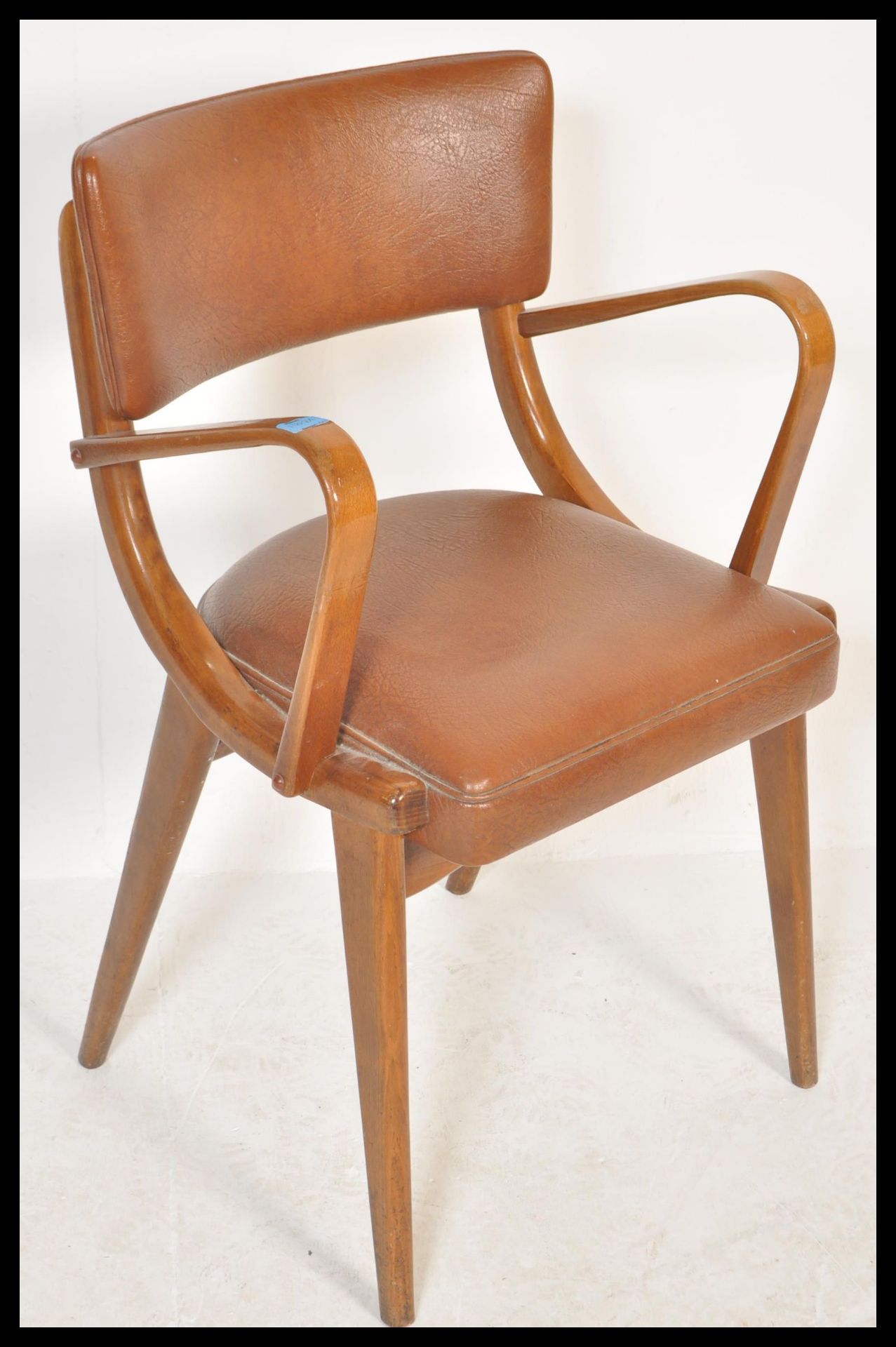 A vintage retro 20th Century Ben Chairs armchair raised on shaped angular legs with leather / faux - Bild 3 aus 5