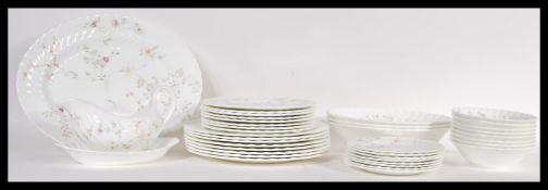 An extensive Wedgwood Bone China Campion pattern dinner service, most pieces unused within the