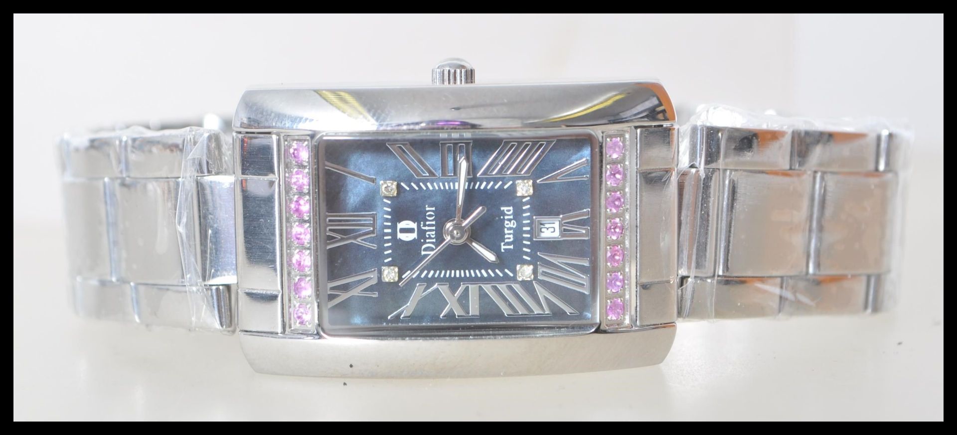 A 20th Century Diafor Turgid ladies wrist watch, having a stainless steel case and bracelet, with