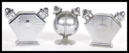 A group of three vintage early 20th Century art deco double dual condiment shakers consisting of a
