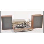 A vintage retro 20th Century teak cased Dansette record player Model No A4005, fitted with a BSR