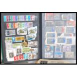 A collection of mostly 20th Century world stamps contained within multiple items as well as loose to