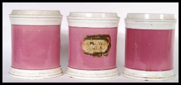 A set of three 19th Century Victorian apothecary chemist shop haberdashery medical storage jars or