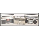 A collection of vintage retro 20th Century radio and radio cassette players to include a Ferguson