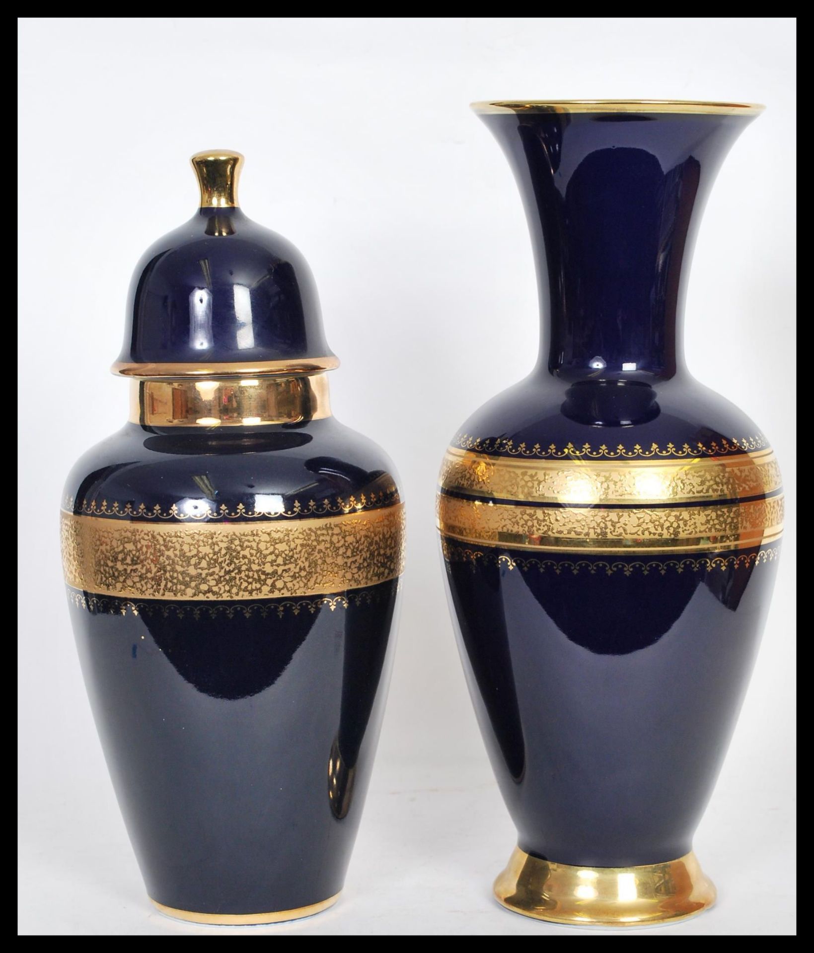 A 20th Century hand painted vase and matching lidded urn by the Royal Porzellan Bavaria KPM
