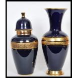 A 20th Century hand painted vase and matching lidded urn by the Royal Porzellan Bavaria KPM