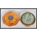 A vintage early 20th Century Art Deco powder mirror compact by Dubarry of circular form having green