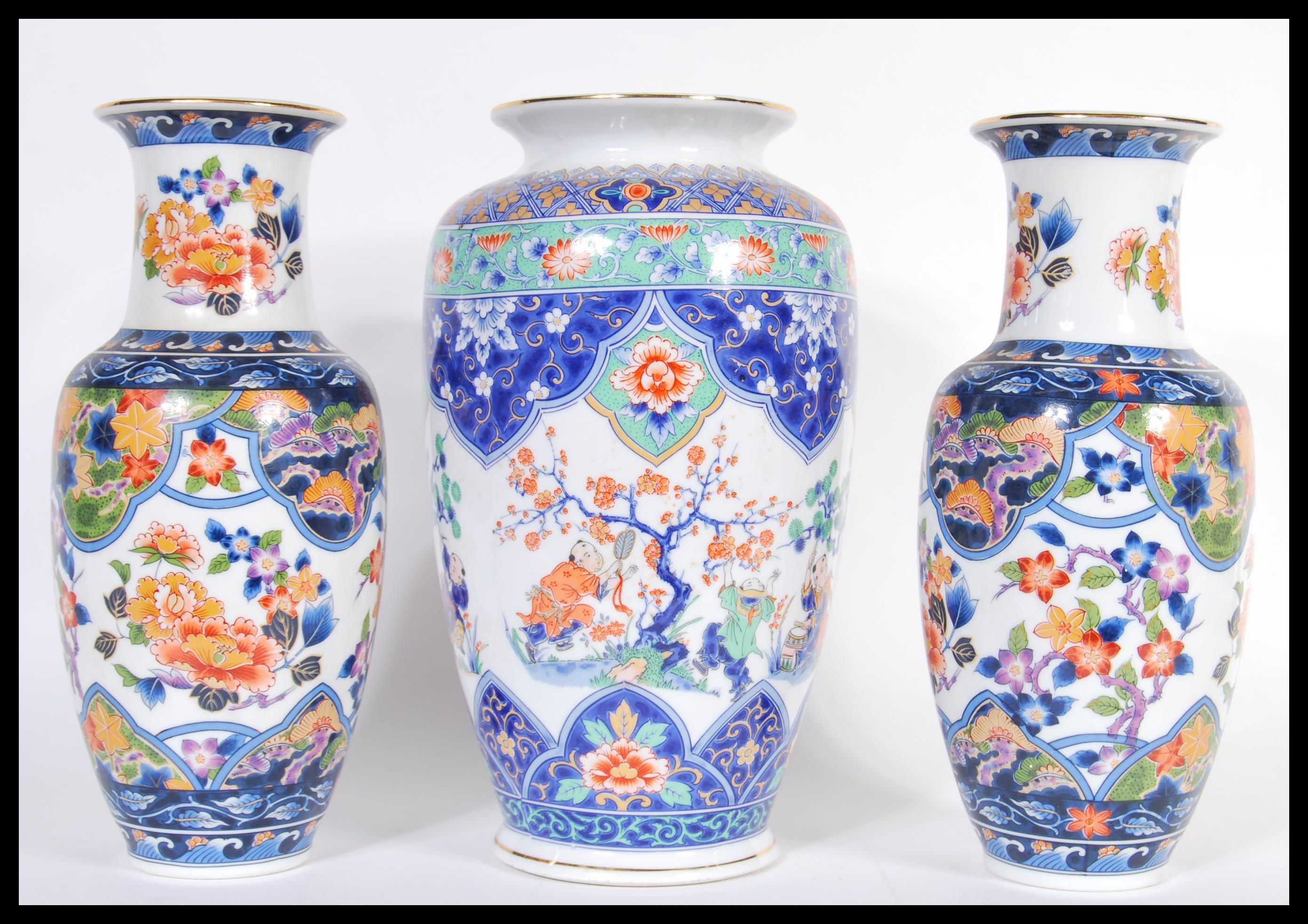 A 20th Century Chinese bulbous vase decorated with musicians and peonies throughout together with - Image 2 of 4