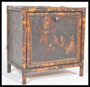 A 19th Century Victorian Aesthetic movement bamboo cabinet having fold down metamorphic action