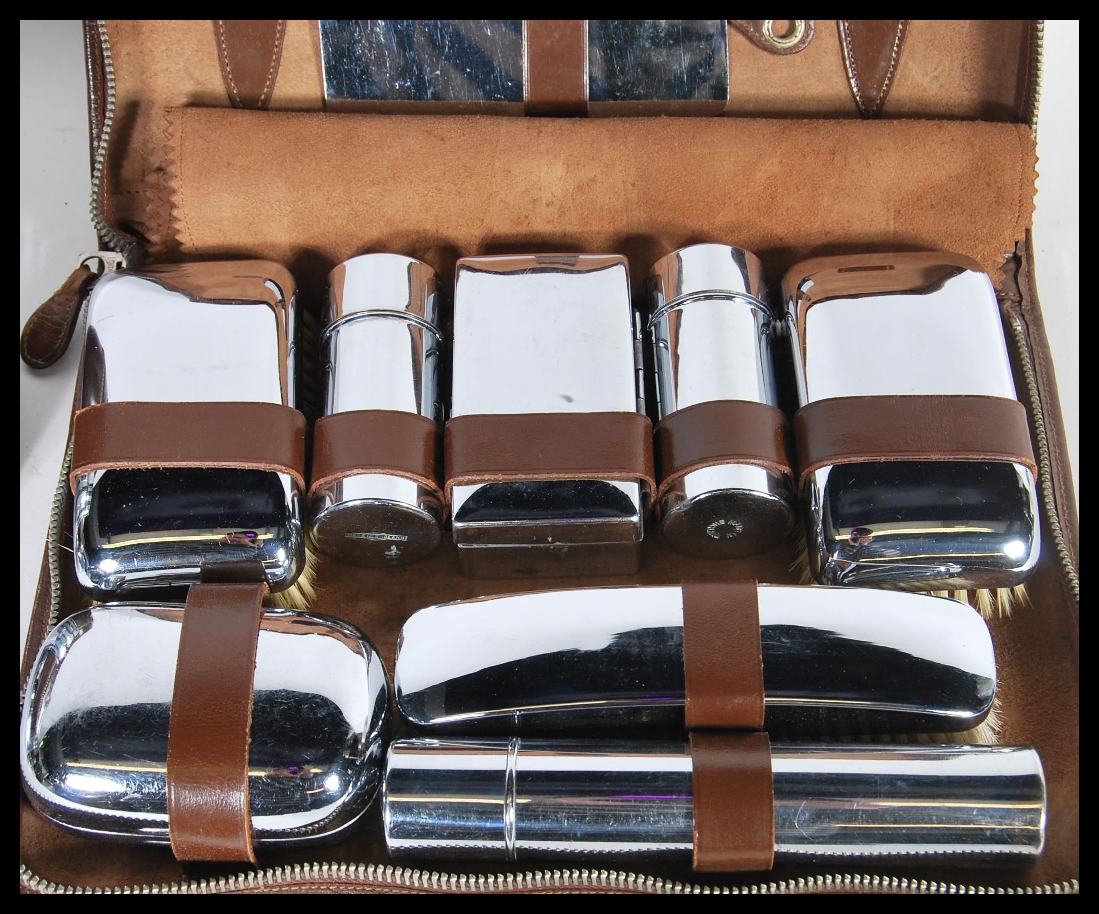 Two vintage 20th Century Gentleman's travelling cased vanity sets having glass bottles and pots with - Image 2 of 4