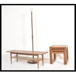 A group of vintage retro 20th Century Danish influence teak furniture to include a surfboard top