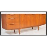 A.H. McIntosh Of Kirkcaldy - Dunvegan range - A 1960's retro vintage teak wood sideboard having